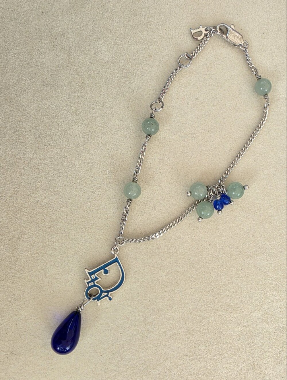 Authentic Dior Silver-tone Bracelet with Green Beads and Blue Charm
